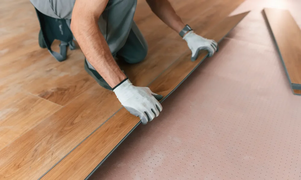 contractor-installing-new-wood-laminate-flooring-a-2026-03-24-05-02-02-utc